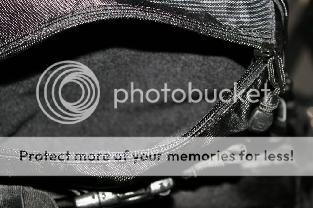 IMAGE: http://i414.photobucket.com/albums/pp230/jeffreyarthur/burton%20zoom/fuzzypocket.jpg